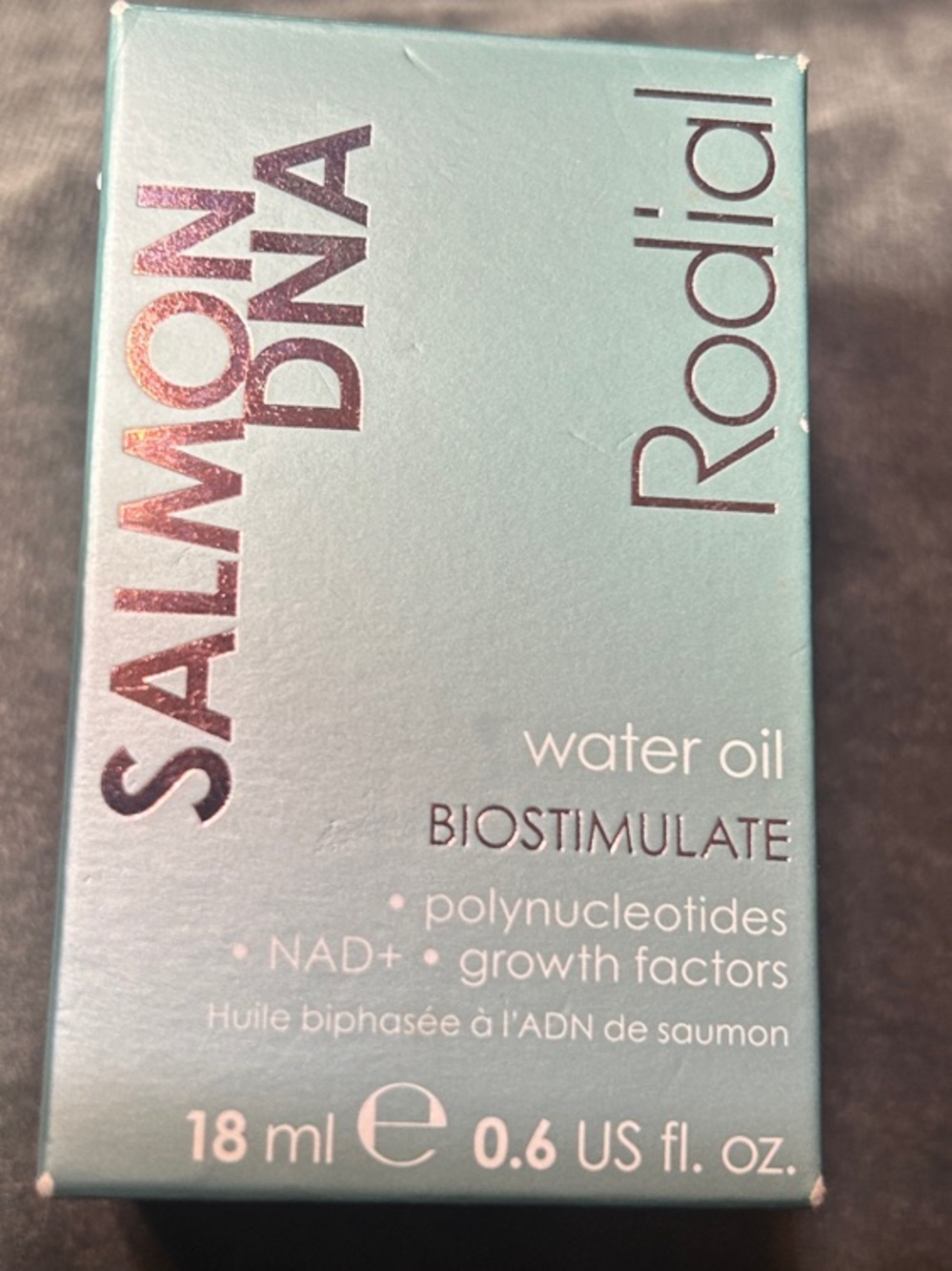 Rodial Salmon DNA Water Oil - Teal and White Packaging